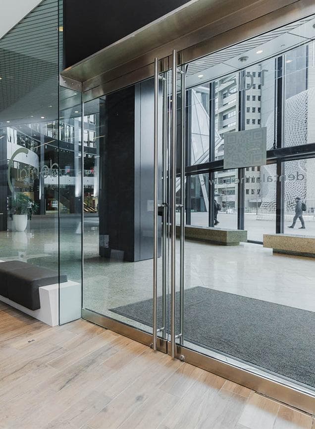 The clinic entrance door at Suite 105 inside The Bow